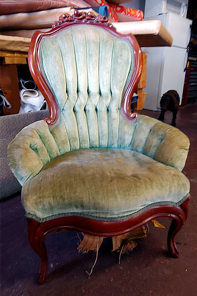 reupholstered green chair