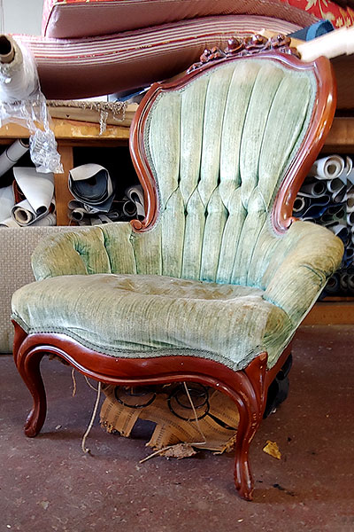 reupholstered green chair